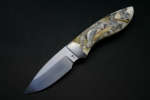 Spitzerl mit Elfenbein-Griffschalen<br /><hr />Klingenlänge: 100 mm<br />Gesamtlänge: 210 mm<br />Klingendicke: 4,3 mm<br />Griffmaterial: Elfenbein mit Scrimshaw von Eva Halat<br />Klingenmaterial: RWL 34